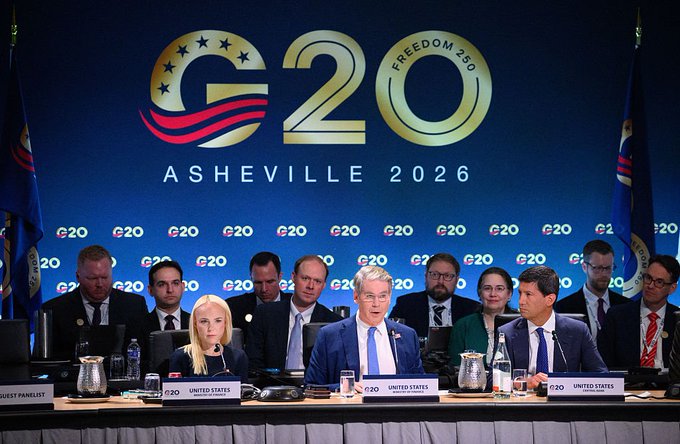 Officials from the United States attend a G20 meeting in Asheville in 2026, with the backdrop reading “G20 ASHEVILLE 2026” and “FREEDOM 250.” The image illustrates the G20’s push toward coordinated regulation of cryptocurrencies and stablecoins, a development the post sees as potentially positive for XRP.
