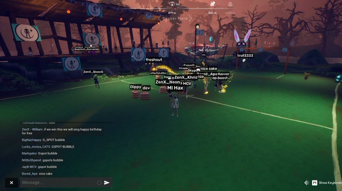 A group of virtual avatars including "Zenk_Khris129," "MI Hax," "Dippy dev," and "ZenX_Leon1" gather on a green field for a soccer game in a Halloween-themed online world, with chat bubbles and an in-game message reading "ZenX - William: if we win this we will sing happy birthday for free." The lively multiplayer scene captures the excitement of the "Lets Go!" moment as players prepare to start the match.