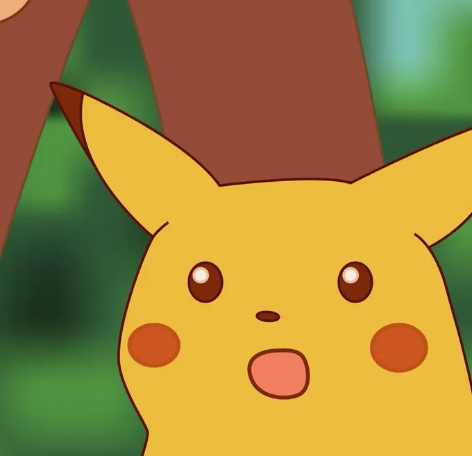 Close-up of Pikachu's face from the Pokémon anime, showing a surprised expression with its mouth open.