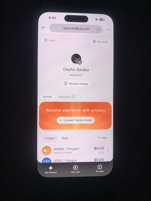 A smartphone displaying the app.handpay.com website for user 'Okafor Amaka' (okafor022), showing wallet balances of $0.00 for HANDL-Polygon and USDC-Polygon.