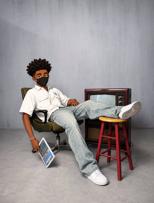 A young man wearing a black face mask, white short-sleeve shirt, and baggy jeans sits relaxed in a chair next to a vintage TV, holding a record sleeve.