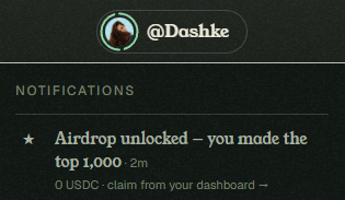 A notification screen showing the handle @Dashke with a message 'Airdrop unlocked - you made the top 1,000' and '0 USDC · claim from your dashboard →'.