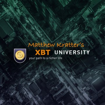 Promotional graphic for Matthew Kratter's "XBT University — your path to a richer life," featuring a Bitcoin logo over an aerial cityscape. The image relates to the post by serving as the branded backdrop celebrating a 598.5 Blake coin donation to the crypto trading education platform.
