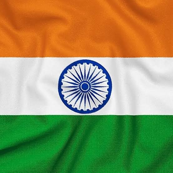 A digital rendering of the flag of India with its horizontal saffron, white, and green stripes featuring the navy blue Ashoka Chakra wheel in the center.