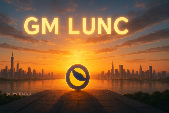 The image shows a golden sunset over a city skyline with a glowing "GM LUNC" text and a circular Terra (LUNC) logo in the center, captioned "@CRYPTOANU." It visually reinforces the post's bullish sentiment toward Terra Luna Classic, combining an energetic "Good Morning" greeting with symbolic imagery of a rising sun to suggest a new dawn for LUNC and the broader altcoin market.