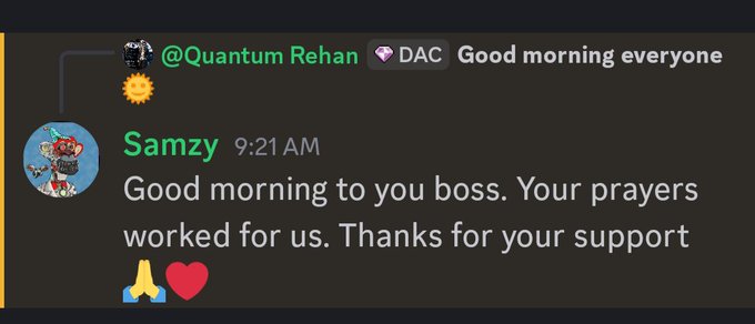 A Discord chat screenshot where user '@Quantum Rehan' posts 'Good morning everyone' and user 'Samzy' replies at 9:21 AM, 'Good morning to you boss. Your prayers worked for us. Thanks for your support' with praying hands and red heart emojis.