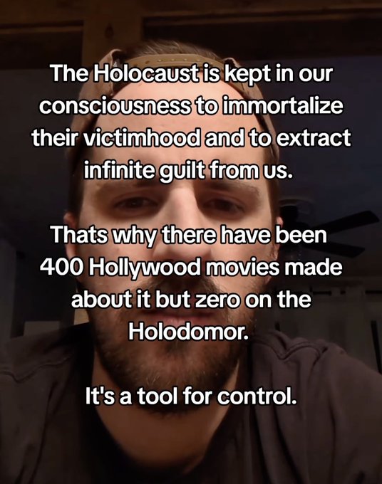A man with a beard wearing a headband speaking, overlaid with text claiming 'The Holocaust is kept in our consciousness to immortalize their victimhood and to extract infinite guilt from us... It's a tool for control.'