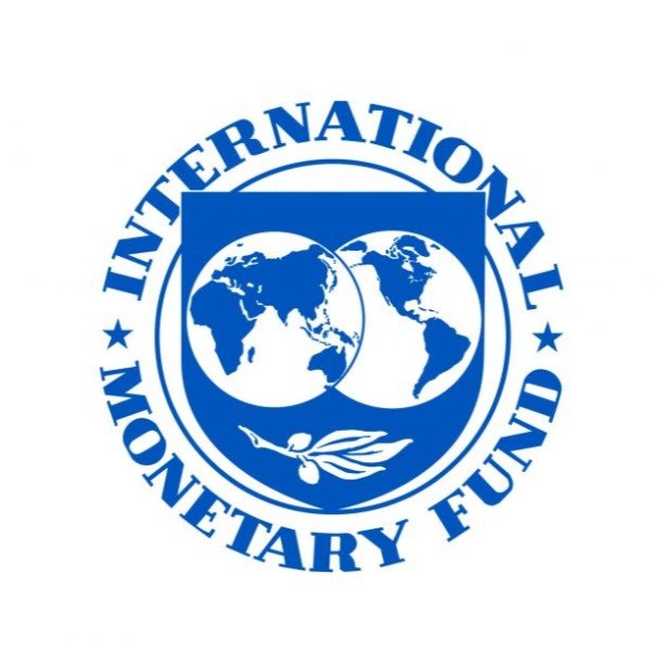 The official blue and white seal of the International Monetary Fund (IMF).