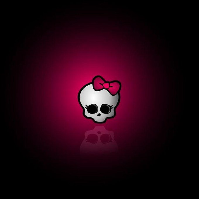 The image features a white skull with a pink bow around its neck, set against a black background. The skull appears to be facing towards the right side of the frame. There are no other objects or text present in the image.