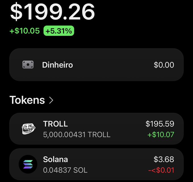 A cryptocurrency portfolio dashboard showing a total balance of $199.26 (+$10.05, +5.31%), with holdings in TROLL ($195.59) and Solana ($3.68), and a 'Dinheiro' account at $0.00.