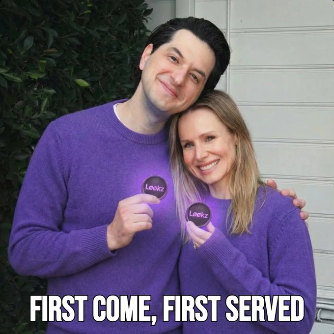iced coffee and a purple sweater with "Lekz" written on it, accompanied by a smiling couple against a white wall backdrop.
![alt text](https://www.pixabay.com/photo/3/12/2012)