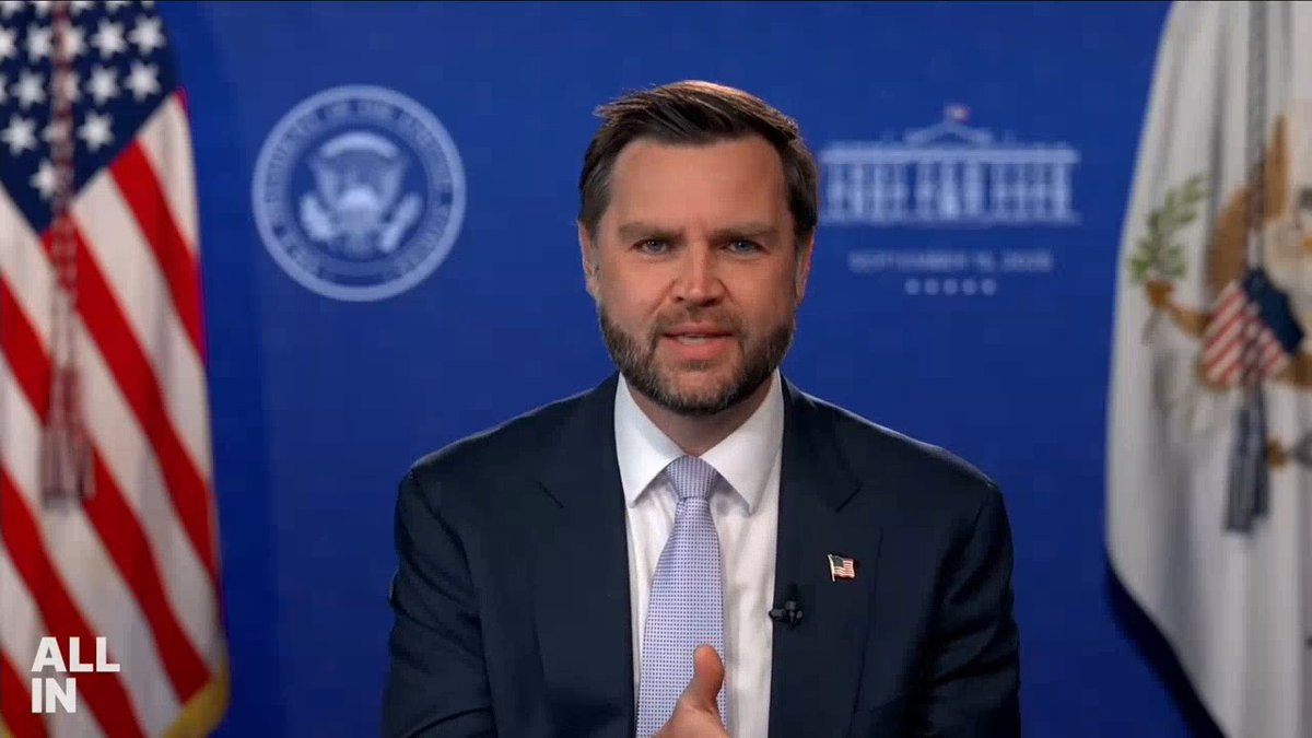 JD Vance, wearing a dark suit with a light blue tie, speaks at a podium with the American flag and White House seal in the background; the 'ALL IN' podcast logo is visible.