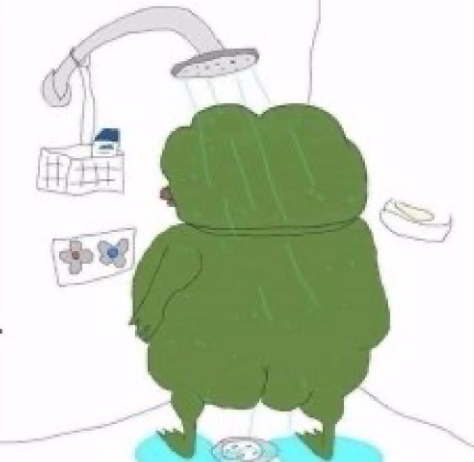 A green Pepe character standing under a shower in a bathroom, fully clothed.