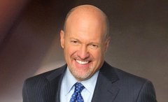 The image shows a smiling, bald man with a goatee wearing a dark suit and patterned tie, likely a financial commentator or analyst. The "Bullish! Send it Higher!" caption aligns with his confident, upbeat expression, suggesting his endorsement of a rising market or stock.