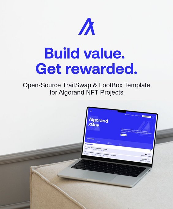 The image shows a laptop computer sitting on top of a couch, with the screen facing upwards. The background appears to be white, but there are no texts or other objects visible in the scene. The main focus of the image is the laptop, which seems to be turned on and ready for use.