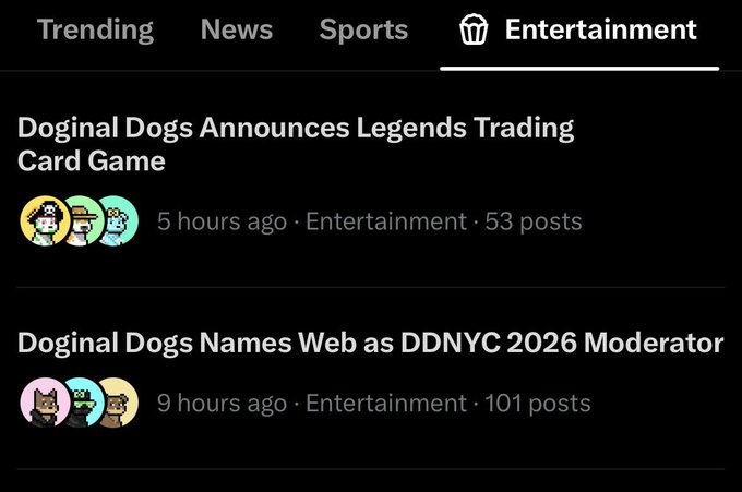 A screenshot of an Entertainment news feed on Reddit featuring two headlines: 'Doginal Dogs Announces Legends Trading Card Game' (5 hours ago, 53 posts) and 'Doginal Dogs Names Web as DDNYC 2026 Moderator' (9 hours ago, 101 posts).