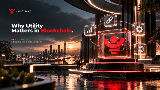 A promotional graphic for 'JUST DAO' titled 'Why Utility Matters in Blockchain' features a glowing red logo inside a glass cube, set against a futuristic cityscape at sunset.