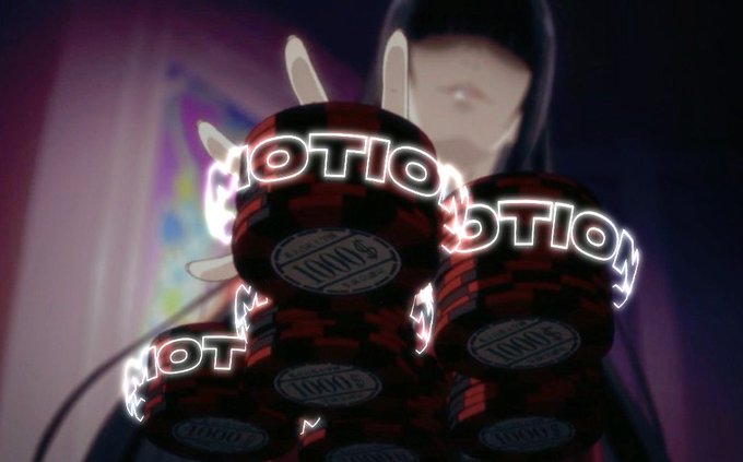 A close-up of red and black Baskin-Robbins 'Emotion' branded ice cream scoops with a person's face blurred in the background.