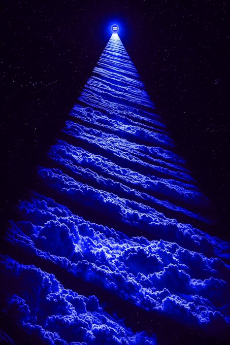A surreal digital artwork showing a glowing doorway or portal at the top of a narrow, steep staircase made of blue, cloud-like formations against a starry night sky.
