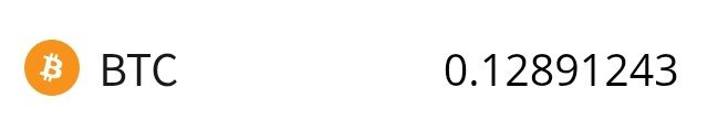 A display showing a Bitcoin (BTC) balance of 0.12891243 next to the orange Bitcoin logo.