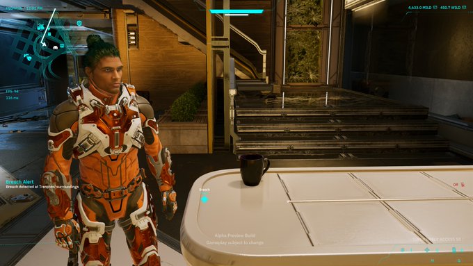 A first-person sci-fi video game scene showing a character in orange-and-white futuristic armor beside a table with a black mug; HUD text includes “Alpha Preview Build” and “Gameplay subject to change.”