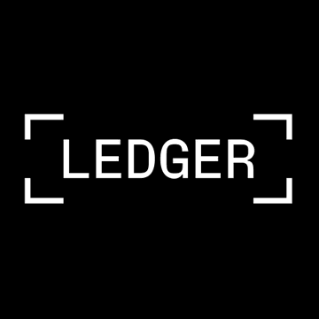 The image displays the "LEDGER" logo in white text enclosed within corner brackets on a black background. The post relates to the image by referencing Ledger's investigation into a major security incident involving stolen crypto funds from compromised hardware wallet devices.