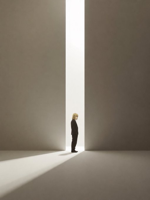 A person with blonde hair stands in a narrow vertical beam of light between two massive concrete walls in a dimly lit, minimalist space.