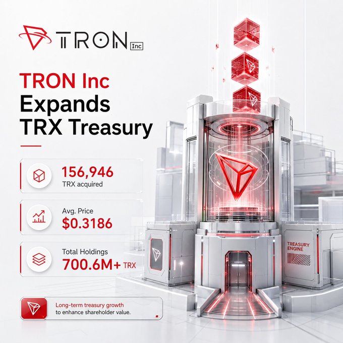 The image features a large white tower with three red cubes stacked atop one another, creating an impressive visual effect. The tower appears to be made of metal or glass, giving it a futuristic appearance. Below the tower, there are three smaller cubes positioned at different heights and angles, adding depth to the scene. In the background, there is text that reads "Tron Inc. Expands TRX Treasury".