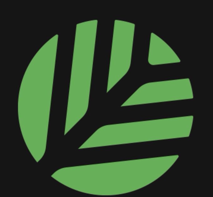 A minimalist logo featuring a green circular emblem with stylized shapes resembling trees or rays set against a black background.