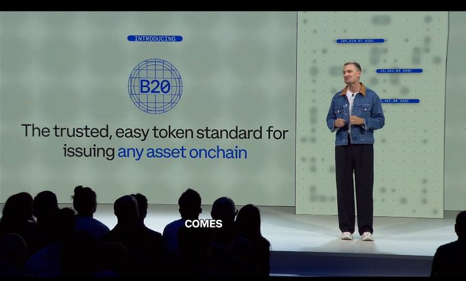 The image shows an event where a man is standing on stage giving a speech or presentation. The audience consists of people sitting behind a screen, watching him speak. The speaker's name tag reads "Base Beryl", indicating that he might be related to the cryptocurrency industry. The text in the image suggests that the main focus of the event is tokenization and its potential impact on financial assets.