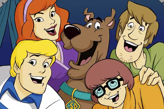The classic Scooby-Doo gang (Daphne, Fred, Scooby-Doo, Shaggy, and Velma) smiling together in a group selfie-style illustration.