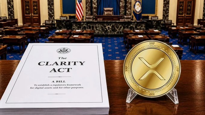 A document titled "The CLARITY ACT - A BILL To establish a regulatory framework for digital assets and for other purposes" sits on a desk in what appears to be a legislative chamber, next to a gold XRP cryptocurrency coin.