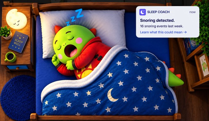 An advertisement image showing a cute 3D-rendered character wearing a green dinosaur hood and a red hoodie sleeping in bed under a blue star-patterned blanket, with a notification from "SLEEP COACH" reading "Snoring detected. 16 snoring events last week. Learn what this could mean."