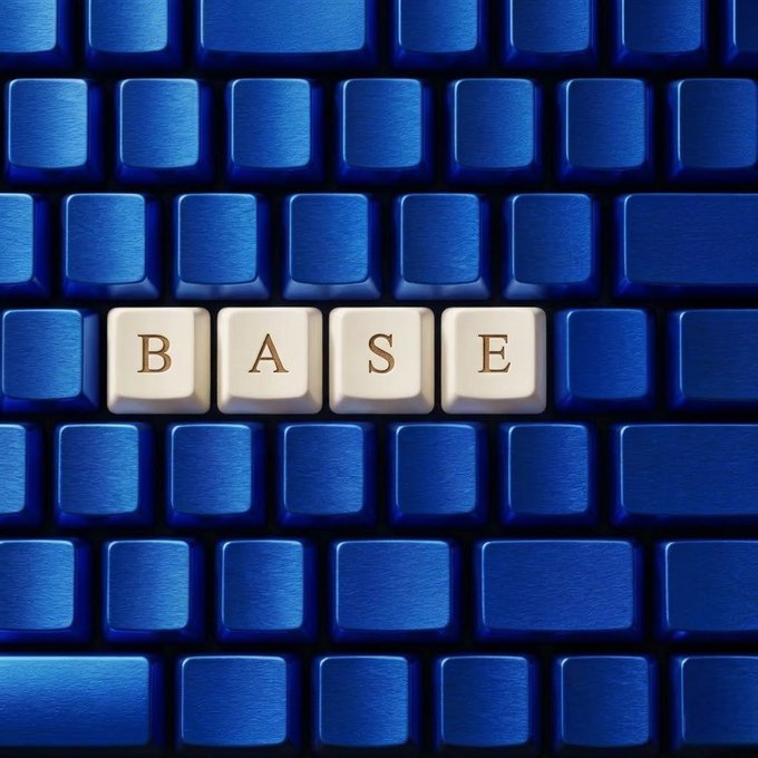 A close-up of a blue keyboard where four white keys stand out, spelling out the word 'BASE' in black letters.