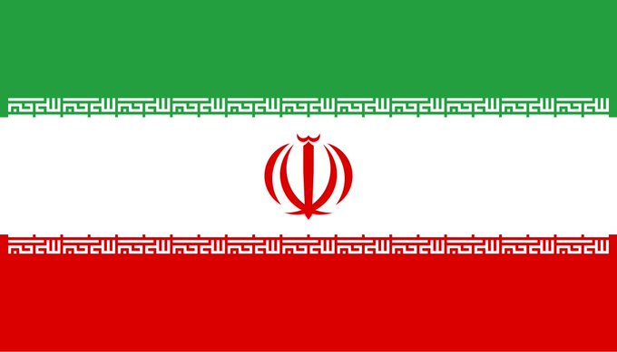 The image shows the flag of Iran, featuring horizontal green, white, and red stripes with a red emblem in the center and decorative script along the borders. The flag's colors and emblem serve as a stark visual representation of Iran, possibly used in the post to draw a parallel between the country's situation and the poster's pessimistic view of their generation's prospects.