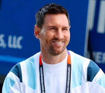 Lionel Messi is shown smiling in what appears to be a light blue and white striped Argentina jersey, likely before the match where a $930,000 bet was placed against Egypt's chances of winning. The image highlights the very opponent (Argentina) that bettors wagered against, with Messi as the star player they were betting wouldn't lead his team to victory.