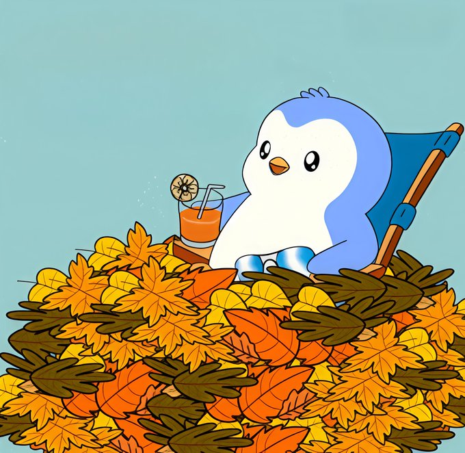 An illustrated penguin wearing sunglasses relaxes in a blue beach chair among autumn leaves, holding an orange drink with a straw and lemon slice.