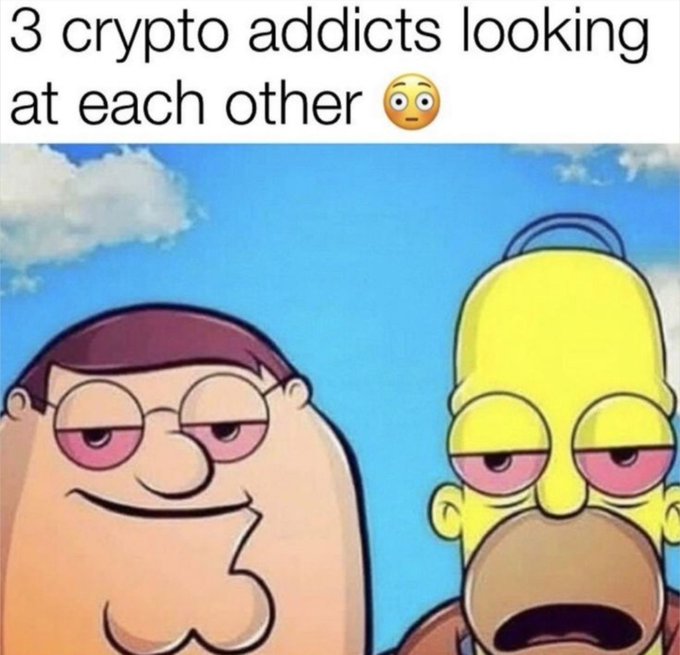 The image is a meme with the text "3 crypto addicts looking at each other" featuring a crossover of Family Guy's Peter Griffin and The Simpsons' Homer Simpson, both shown with bloodshot, glazed-over eyes and half-closed eyelids—capturing the exhausted, "checked-out" look of someone deep in a crypto trading spiral. The post's reply of "True" suggests agreement with the relatable humor about crypto addiction and its obvious, almost zombie-like signs that fellow addicts can spot in each other.