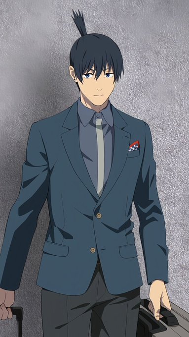 An anime-style illustration of a young man with black hair in a teal blazer, grey shirt, and tie, holding a briefcase against a plain grey background.