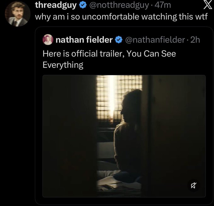 Screenshot of an X (Twitter) post exchange where 'threadguy' (@notthreadguy) replies 'why am i so uncomfortable watching this wtf' to 'nathan fielder' (@nathanfielder)'s post captioned 'Here is official trailer, You Can See Everything' with a dim image of a person silhouetted by a window.