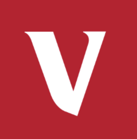 A bold white "V" logo appears on a deep red background, representing Vanguard's branding. The image accompanies news that Vanguard is hiring a head of digital assets to develop a crypto investment strategy for personal wealth clients.