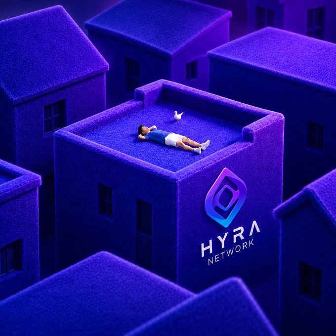 A miniature figure rests peacefully on the rooftop of a plush, deep-blue building alongside a white bird, surrounded by similar structures that form a soft, toy-like cityscape. The building displays the "HYRA NETWORK" logo, symbolizing the brand's decentralized, people-powered vision of finding a personal space within a connected community.