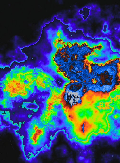 A vibrant, multi-colored heat map or false-color visualization of a cosmic object, likely a supernova remnant or nebula, displaying red, yellow, green, and blue regions.