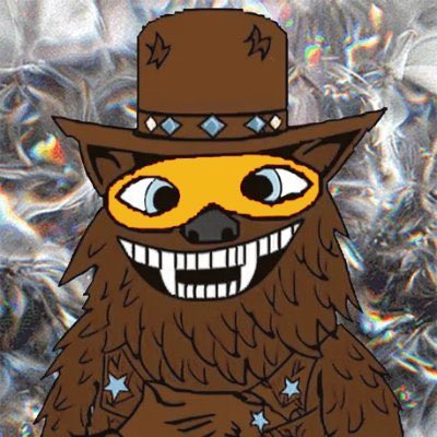 A cartoon illustration of a smiling, furry brown creature wearing a brown top hat with stars, featuring a yellow mask with large eyes and prominent teeth, set against a crinkled holographic background.