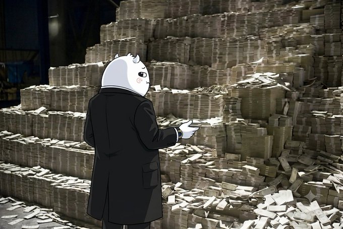 An animated bear character wearing a black suit stands before towering stacks of cash, examining a small device in his hand.