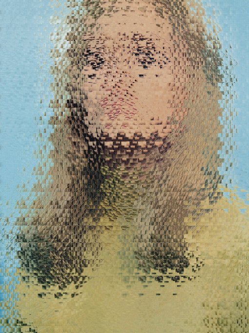 A pixelated, mosaic-style portrait of a person that appears to dissolve into blocky fragments against a blue sky background.