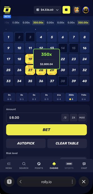 A mobile screenshot of a crypto gambling interface on rolly.io showing a grid of numbers, with a highlighted '350x' multiplier of $2,800.04 and an $8.00 bet amount.