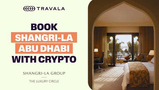 An advertisement for Travala promoting that you can "BOOK SHANGRI-LA ABU DHABI WITH CRYPTO," featuring the Shangri-La Group logo and a photo of a luxurious hotel room with a balcony view.