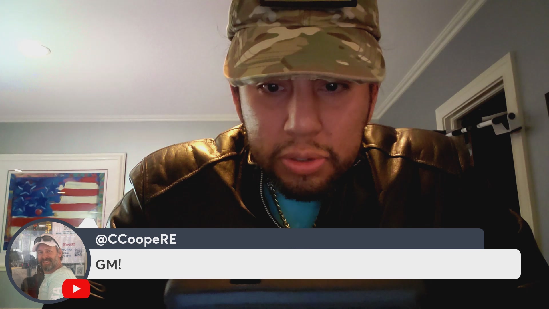 The image features a man wearing a camo hat with his face partially visible as he looks at something off-camera. The caption of the image reads "Emma Frost drop on VeVe, live! $OMI about to break to upside!". This suggests that there is an ongoing event or discussion related to the post, and the man's focus indicates that it might be a topic of interest for him.