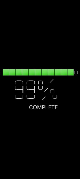 A battery display screen shows a full green battery indicator and the number "99%" with the word "COMPLETE" below it, suggesting a fully charged state that visually represents bullish energy or a completed milestone for the $ROAR stock/cryptocurrency.